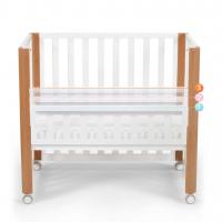 KINDERKRAFT Postieľka drevená Koya s funkciou ohrádky vrátane matraca