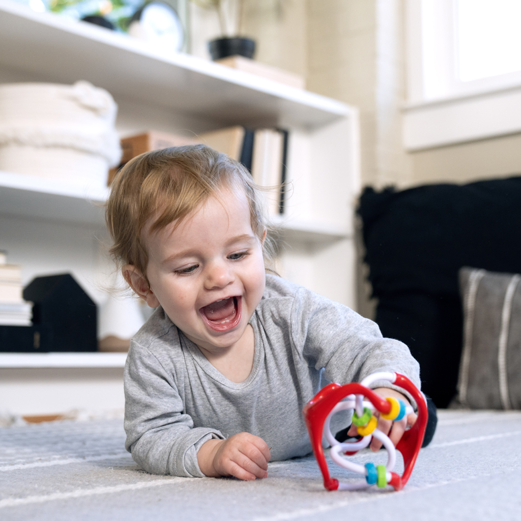 BABY EINSTEIN Hračka lopta senzorická Slide &amp; Swirl™ 0m+