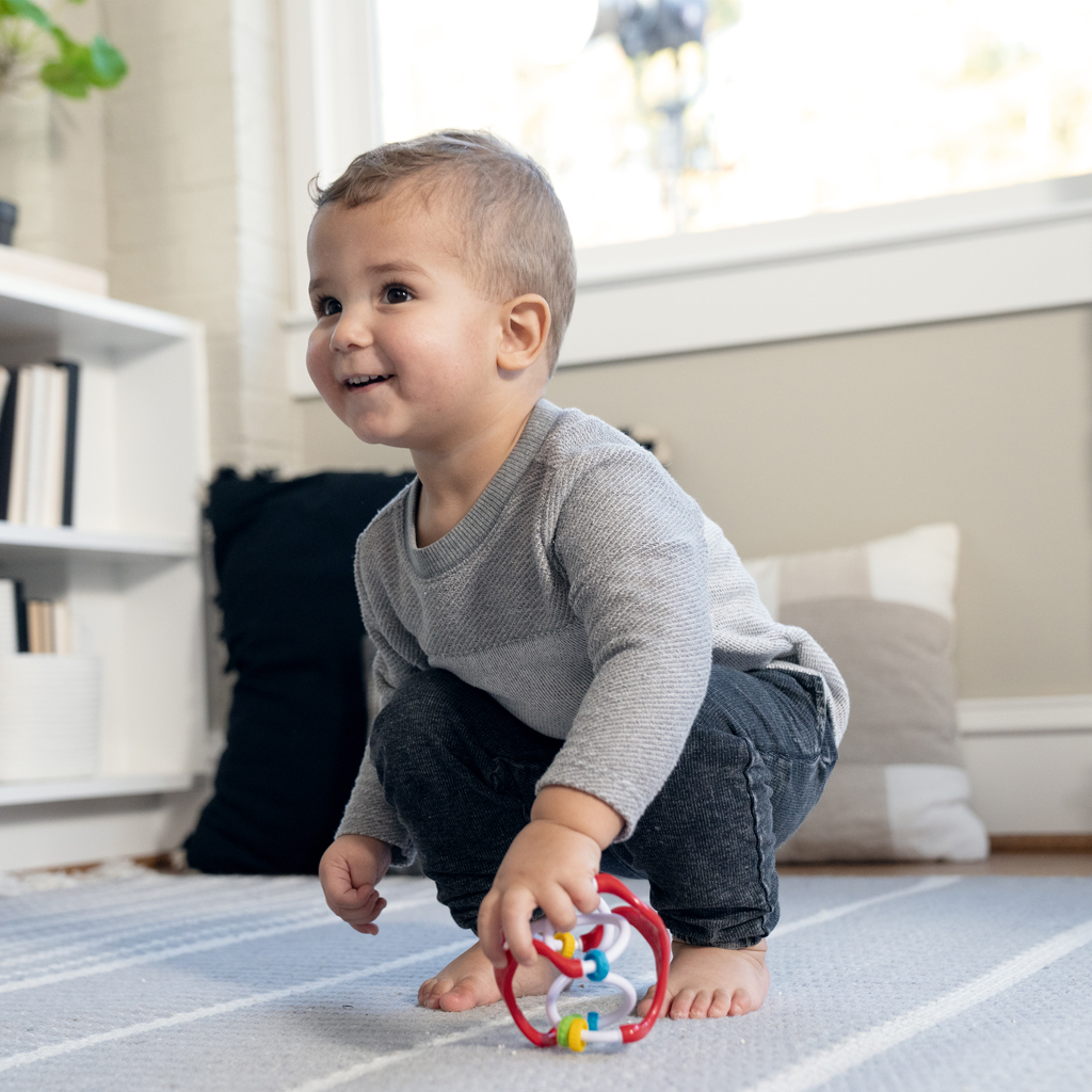 BABY EINSTEIN Hračka lopta senzorická Slide &amp; Swirl™ 0m+