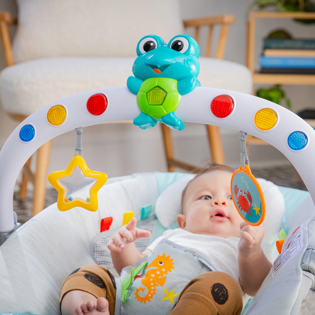BABY EINSTEIN Lehátko hudobné vibračné so svetielkami Kick to It Neptune do 9 kg