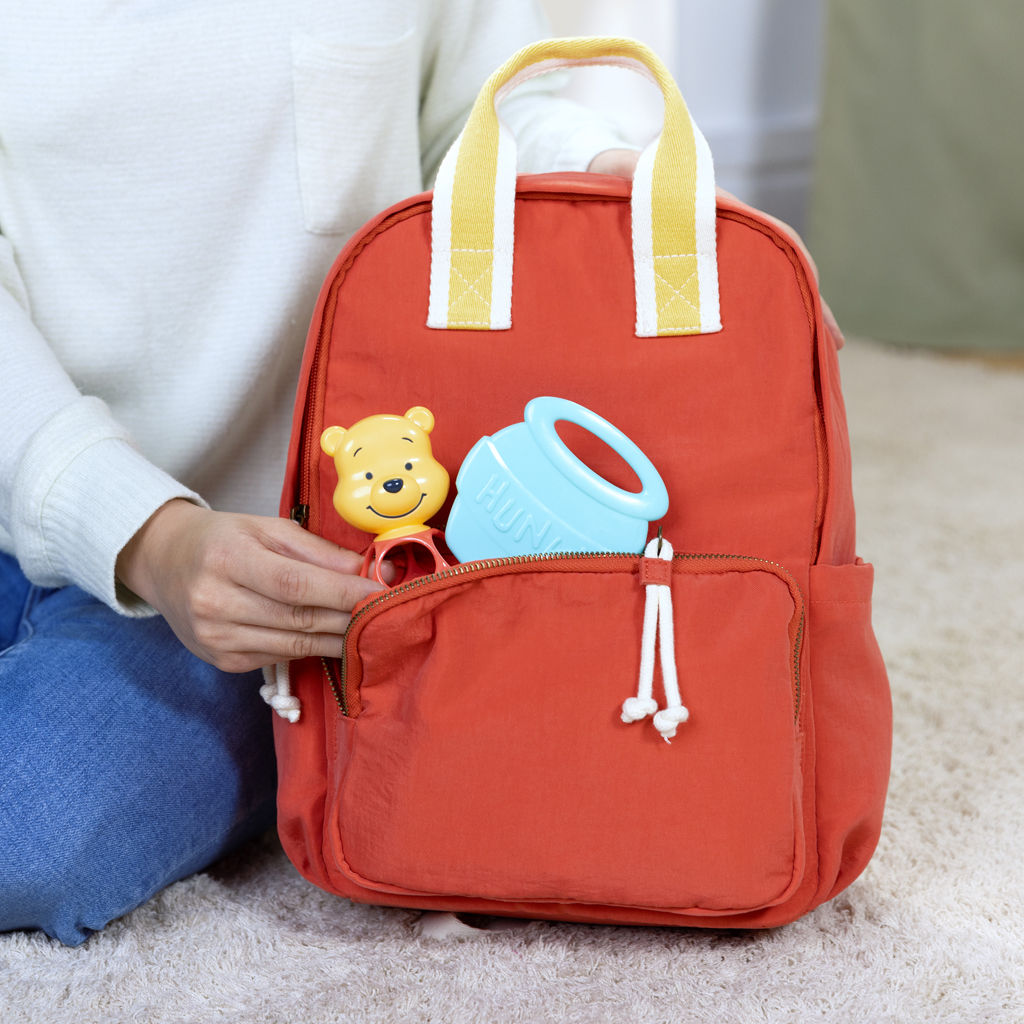 BRIGHT STARTS Hryzačka s hrkálkou Winnie the Pooh™ Hunny &amp; Shake™ 2ks, 0m+