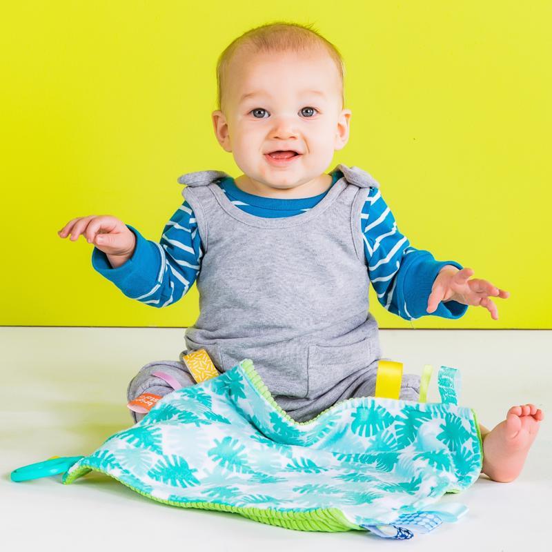 BRIGHT STARTS Maznacia dečka na C krúžku Little Taggies palmy 0m+