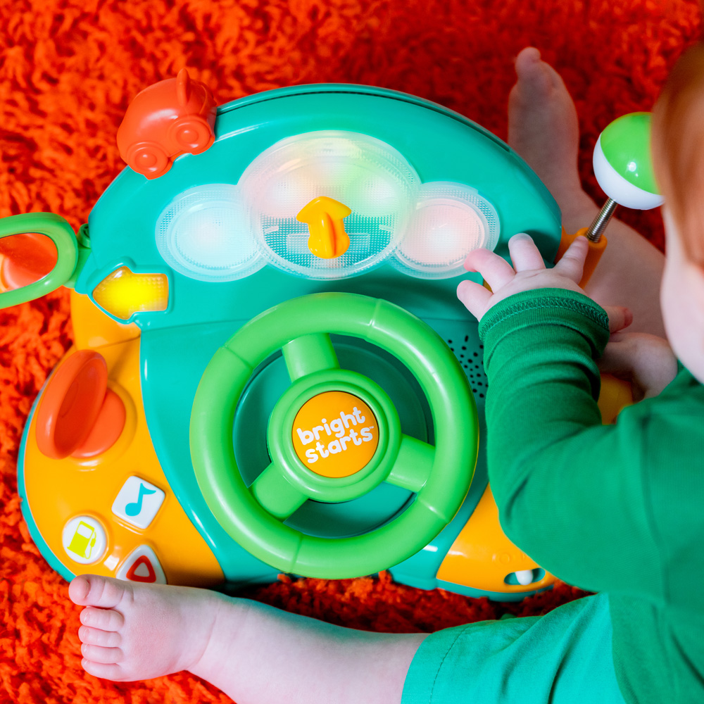 BRIGHT STARTS Hračka hudobná svetelná volant Lights&amp;Colors Driver™ 6m+