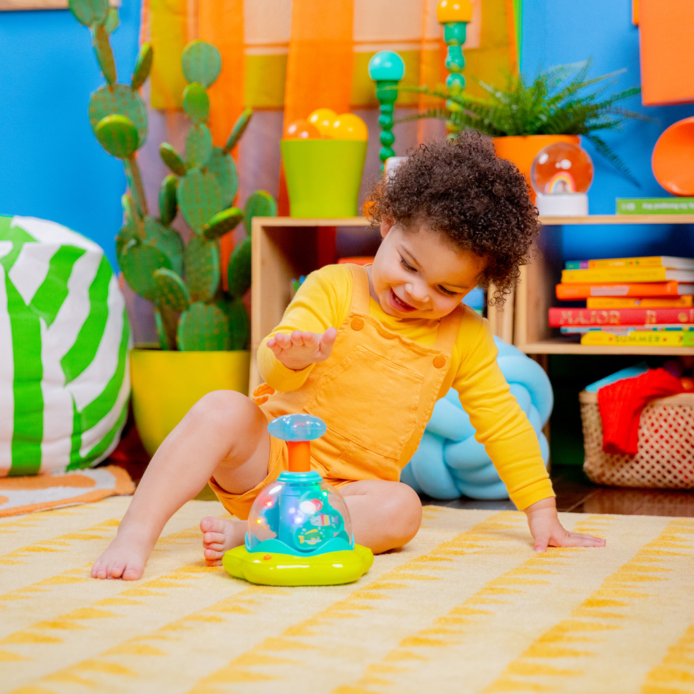 BRIGHT STARTS Hračka hudobná svietiaca Press&amp;Glow Spinner 6m+