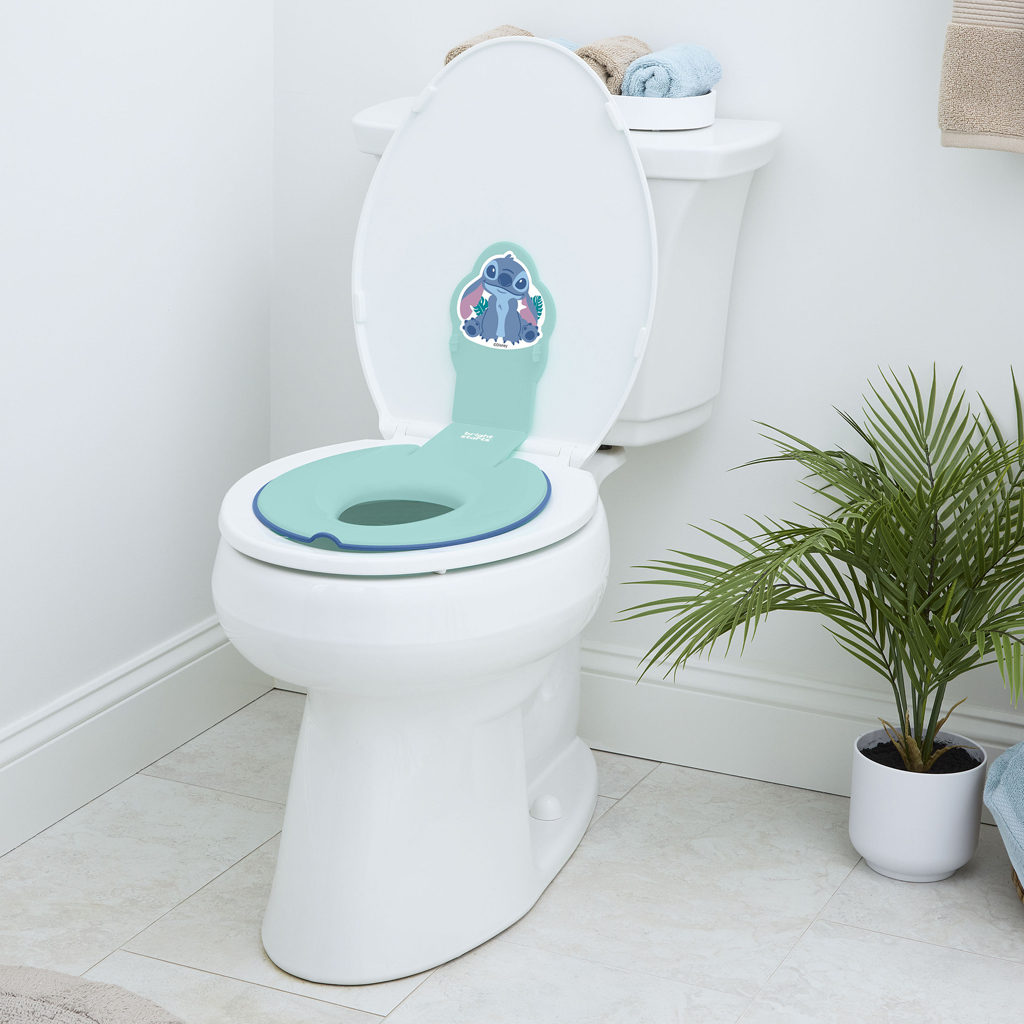 BRIGHT STARTS Redukcia na WC nalepovacia Flip &amp; Sit™ STITCH™ 18m+, do 23kg