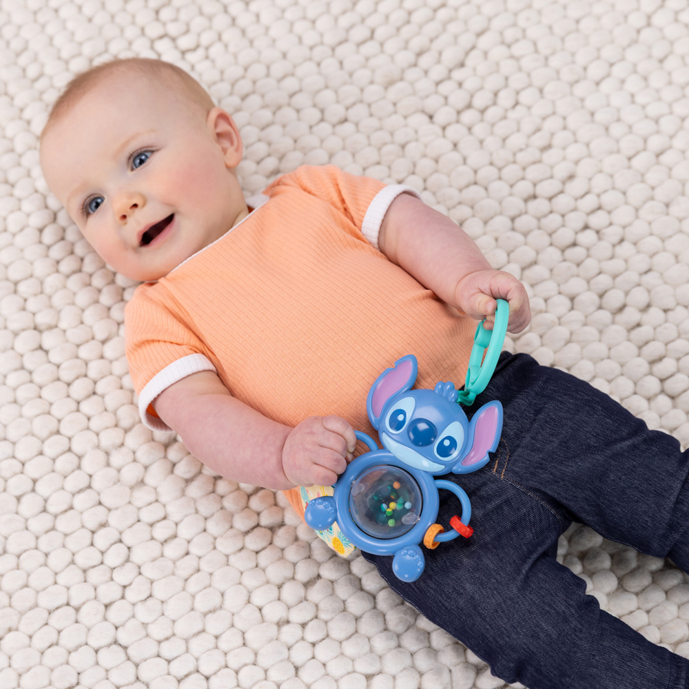 BRIGHT STARTS Hračka na C krúžku senzorická Stitch Tummy Tumble™ 0m+