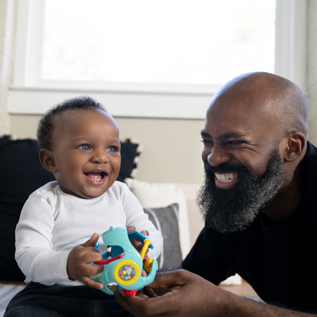 BABY EINSTEIN Hračka senzorická lopta s hryzačkou Rattle &amp; Sense™ 3m+